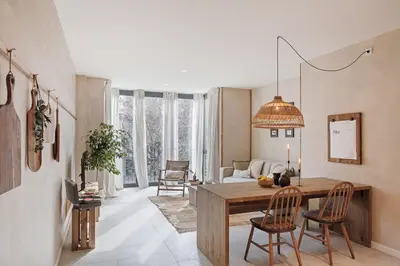 a bedroom with a bed with a candle on it at Nivar - 2 bedrooms in Eixample Esquerra in Barcelona