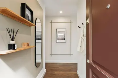 a bedroom with a desk and a bed at Neu - 2 bedrooms and terrace in Eixample Esquerra in Barcelona