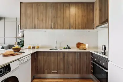 a living room with a couch and a table at Neu - 2 bedrooms and terrace in Eixample Esquerra in Barcelona