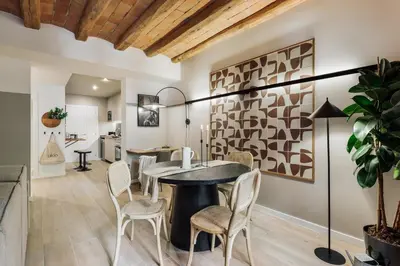 a dining room with a table and chairs at Cadaques - 1 bedroom and balcony in Sant Antoni in Barcelona