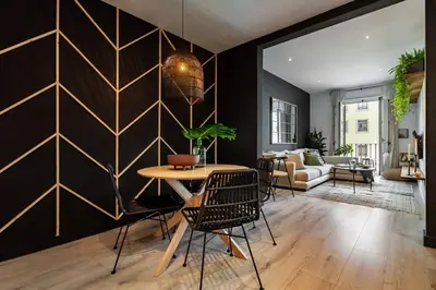 a living room with a white couch and a table at Quena - 2 bedrooms and balcony in Eixample Dreta in Barcelona