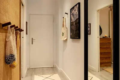 a bedroom with a bed and a pendant light at Quena - 2 bedrooms and balcony in Eixample Dreta in Barcelona