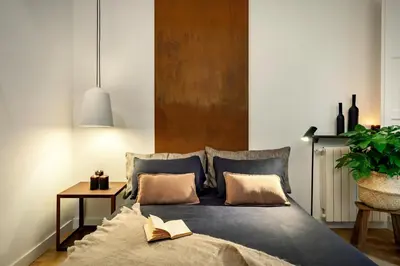 a bathroom with a sink and a washing machine at Akita - 2 bedrooms, terrace in Eixample Esquerra in Barcelona