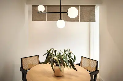 a living room with a couch and a table at Akita - 2 bedrooms, terrace in Eixample Esquerra in Barcelona