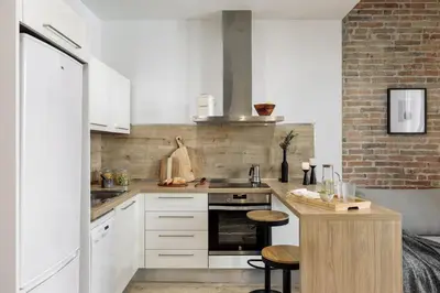 a bathroom with a shower and a toilet and a sink at Espriu - 2 bedrooms and balcony in Sant Antoni in Barcelona