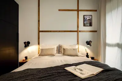 a living room with a kitchen and a dining room at Shokai - 1 bedroom in Ciutat Vella in Barcelona