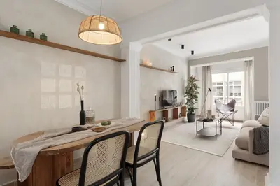 a bedroom with a bed with a tray of food on it at NIVE - 3 bedrooms apartment in Sant Gervasi in Barcelona
