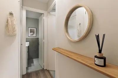 a living room with a couch and a table at Cadi - 1 bedroom apartment in Sant Gervasi in Barcelona