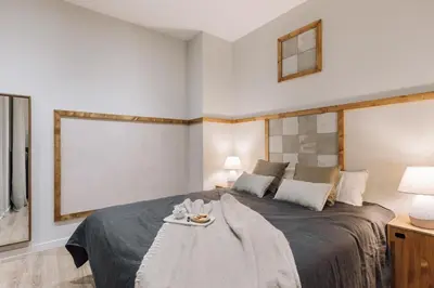 a bathroom with a sink and a shower and a toilet at Giralda - 3 bedrooms in Sagrada Família in Barcelona
