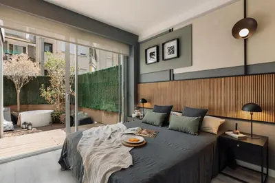 a dining room and living room with a table and chairs at Newman - 3 bedrooms and terrace in Sant Gervasi in Barcelona