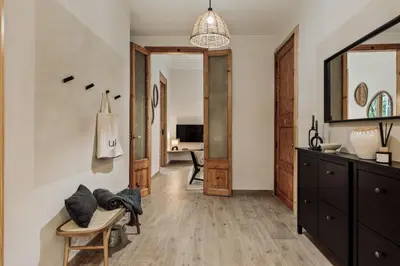 a bathroom with a toilet and a sink and a shower at Krasner - 3 bedrooms in Eixample Dreta in Barcelona