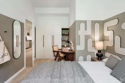 a bedroom with a large bed with two lamps at Aire - 1 bedroom and balcony in Sant Antoni in Barcelona