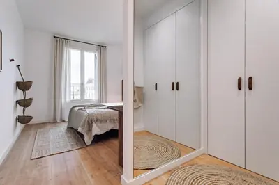 a living room with a couch and a table at Geranio - 1 bedroom in Eixample Esquerra in Barcelona