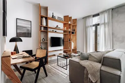 a living room with a couch and a table at Ziga - 2 bedrooms in Sagrada Família in Barcelona