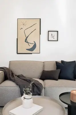 a living room with a couch and a table at Miro - 1 bedroom in El Born in Barcelona