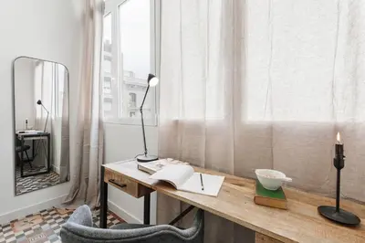 a bathroom with a sink and a toilet and a shower at Mourene - 3 bedrooms in Eixample Dreta in Barcelona