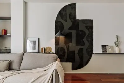 a living room with a couch and a table at Lewitt - 1 bedroom in Eixample Dreta in Barcelona