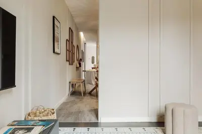 a kitchen and dining room with a table and chairs at Caris - 2 bedrooms and balcony in Les Corts in Barcelona