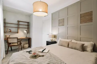 a living room with a couch and a table at Minori - 2 bedrooms and pool in Poblenou in Barcelona