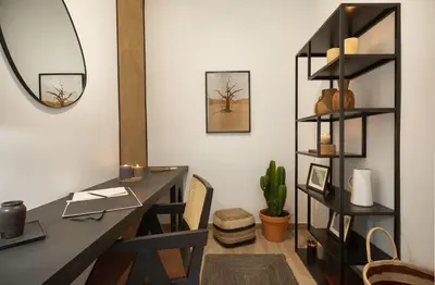 a living room with a couch and a tv at Adigrat - 3 bedrooms in Gràcia in Barcelona