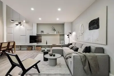 a bedroom with a bed and a desk and chairs at Marce - 3 bedrooms and a terrace in Les Corts in Barcelona