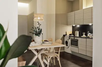 a living room with a couch and a table at Ilani - 2 bedrooms in El Gòtic in Barcelona
