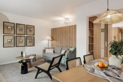 a kitchen with white counters and a sink and two windows at Dota - 3 bedrooms in Sant Gervasi - Galvany in Barcelona