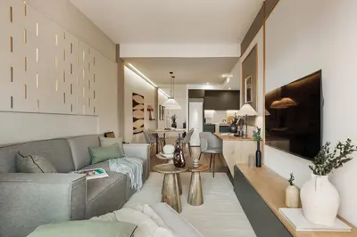 a living room with a couch and a table at Huila - 2 bedrooms and balcony in Les Corts in Barcelona