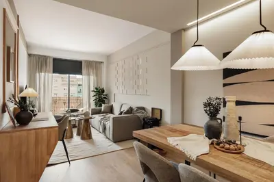 a kitchen and dining room with a table and chairs at Huila - 2 bedrooms and balcony in Les Corts in Barcelona