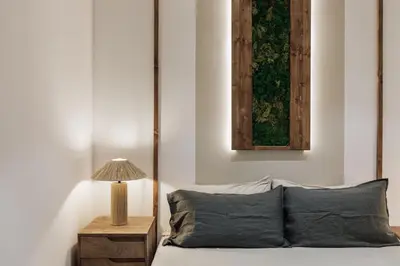 a kitchen with white countertops and a long hallway at Belua - 2 bedrooms in Sarrià in Barcelona