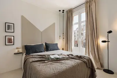 a dining room with a table and chairs at Pavona - 2 bedrooms and terrace in Sants in Barcelona