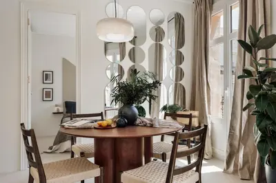 a living room with a couch and a table at Pavona - 2 bedrooms and terrace in Sants in Barcelona