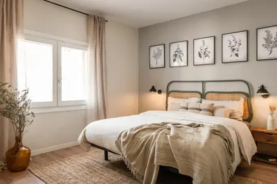 a living room with a couch and a table at Remy - 2 bedrooms and terrace in Eixample Dreta in Barcelona