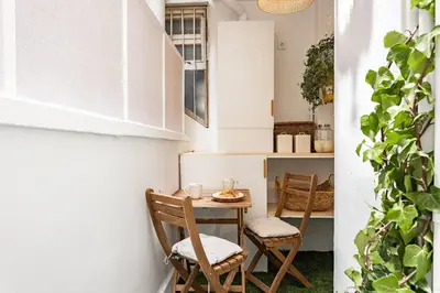 a small dining room with a table and chairs at Barcelona Central Charm with Mediterranean Vibes in Barcelona