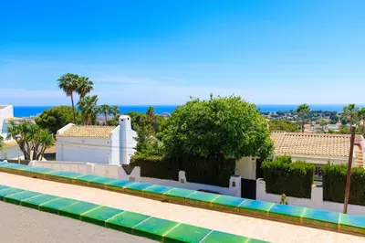 a swimming pool with a view of the ocean at Villa Carmen - Peaceful Eco-Luxury with private pool in Cunit