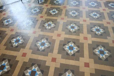 a tiled floor with geometric tiles on it at 12DIA1008 - Fantastic Apartment in Diagonal in Barcelona