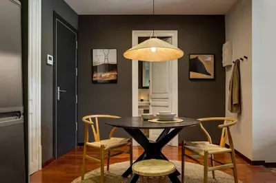 a living room with a couch and a table at Atacama - 1 bedroom in Eixample Esquerra in Barcelona