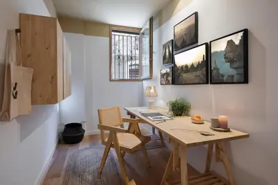 a bathroom with a sliding door and a mirror at Lingga - 2 bedrooms and terrace in Gràcia in Barcelona