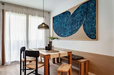a living room with a couch and a table at Oetune - 2 bedrooms and office in Gràcia in Barcelona