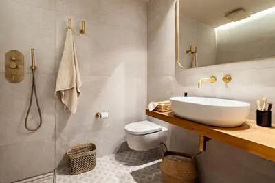 a living room with a couch and a kitchen at Sanur - 2 bedrooms in Gràcia in Barcelona