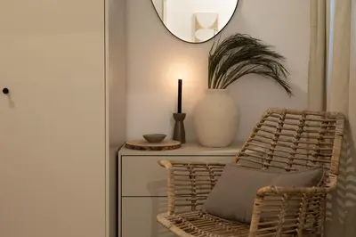 a bedroom with a large white bed with two pillows at Damar - 2 bedrooms and balcony in Eixample Dreta in Barcelona