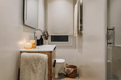 a bedroom with a bed and a mirror at Laurel - 3 bedrooms in Sant Gervasi in Barcelona