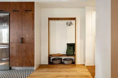 a table with a candle and a picture on a wall at Shan - 1 bedroom and balcony in El Born in Barcelona
