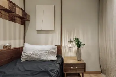 a kitchen with a sink and a tub and a tv at Bayal - 2 bedrooms and balcony in El Putxet in Barcelona