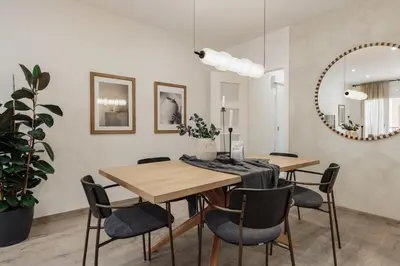 a living room with a couch and a table at Briso - 3 bedrooms and balcony in Vila de Gràcia in Barcelona