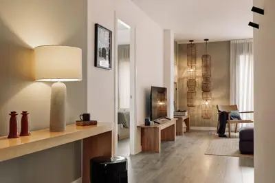 a bedroom with a bed and a large window at Elan - 2 bedrooms and balcony in Sant Gervasi in Barcelona