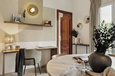 a living room with a couch and a table at Nampi - 2 bedrooms and balcony in El Poblenou in Barcelona