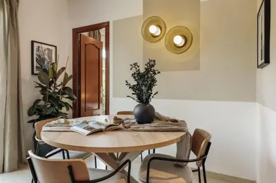 a living room with a couch and a table at Nampi - 2 bedrooms and balcony in El Poblenou in Barcelona