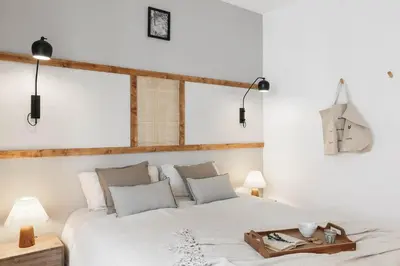 a dining room with a wooden table and chairs at Ravello - 3 bedroom and terrace in Sant Gervasi in Barcelona