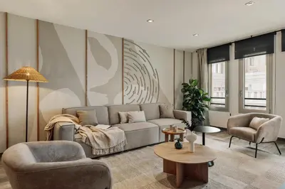a living room with a couch and two chairs at Tarra - 4 bedrooms and terrace in Sant Pere in Barcelona
